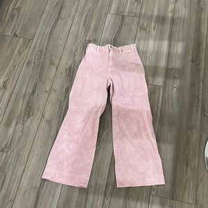pink washed out jeans from anthropologie